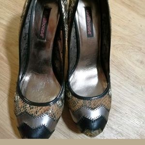Dollhouse high heels snake color.